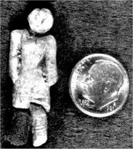 A tiny figurine made of baked-clay was brought up in amongst the debris churned out by the huge drill bit during the drilling of a well in Nampa Idaho in 1889. The object is a one inch long figure with one leg broken off at the knee. 